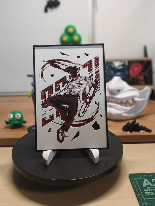 Cuadro 3D artesanal de Denji de Chainsaw Man con relieve tridimensional y marco negro.